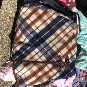 Plaid skirt with leather buckles. Like new.